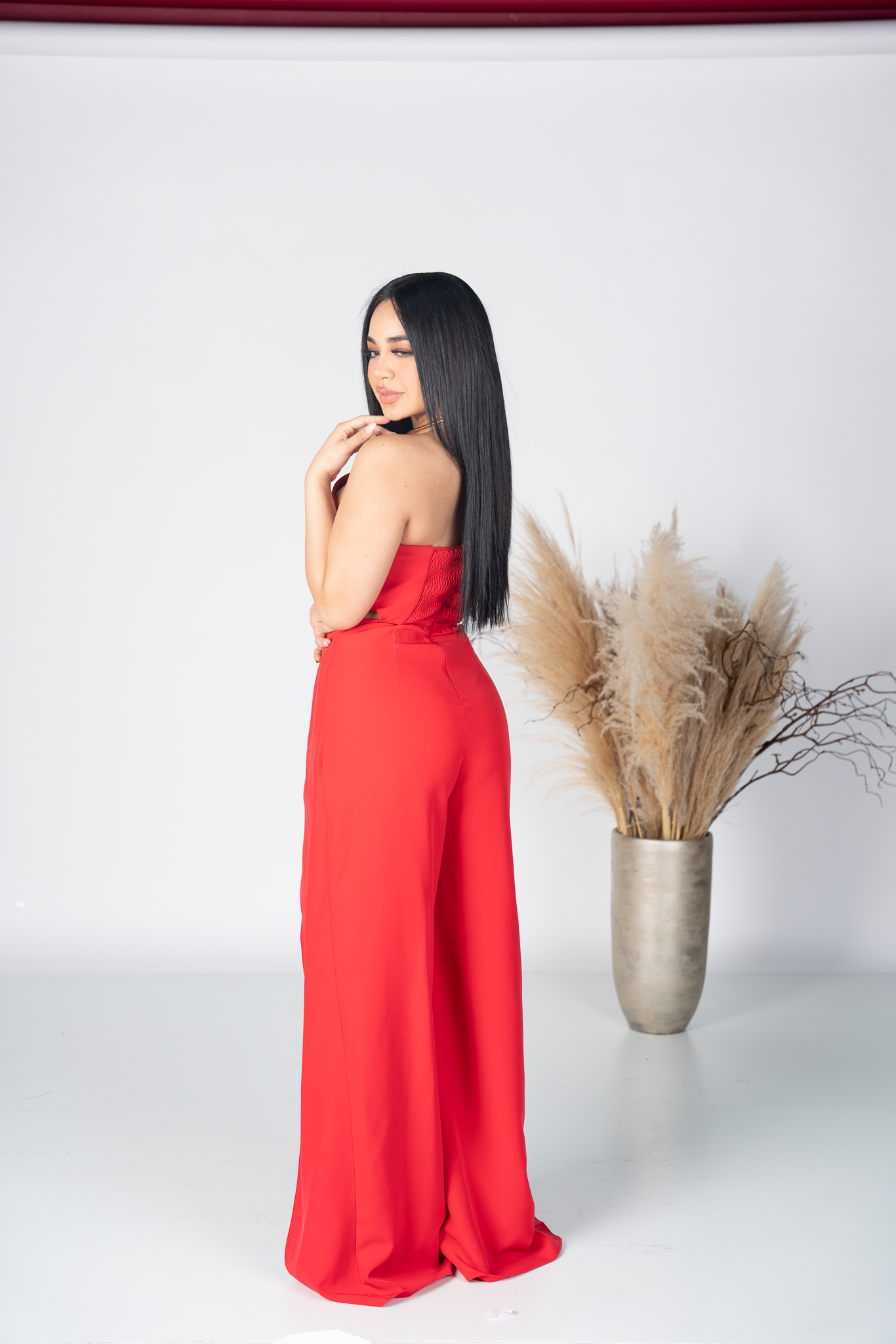 RED HALTER CUTOUT JUMPSUIT